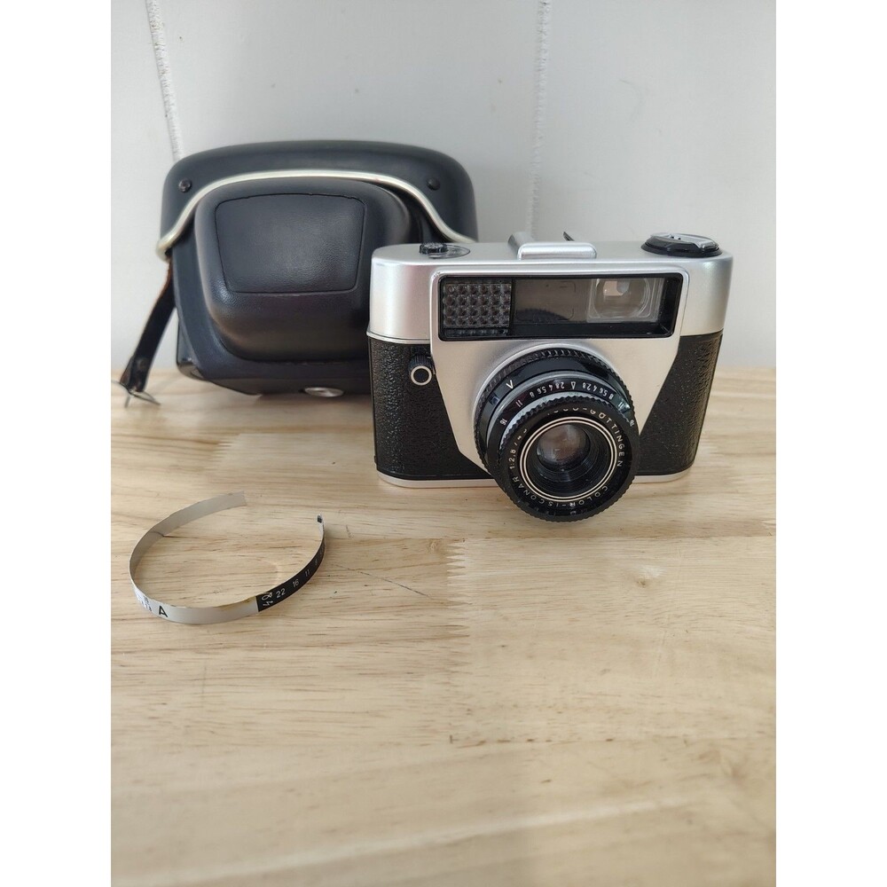 Regula Sprinty Camera with Rexar 45mm f/2.8 Lens and nice leather case read des